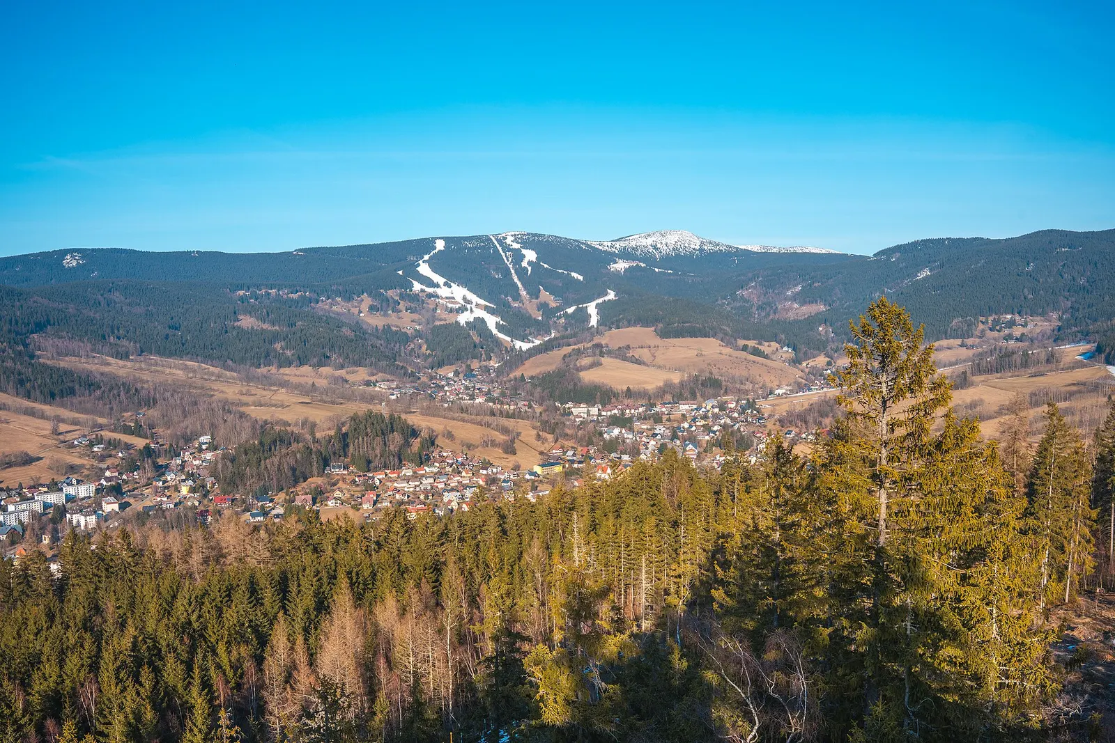 View from Stráž hill above Rokytnice nad Jizerou towards Lysá hora and Kotel in the Krkonoše Mountains